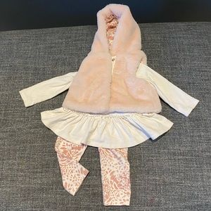 Faux fur vest with matching pants and peplum top